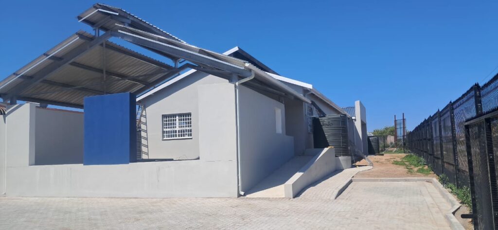 Side view of newly built facility with metal roofing