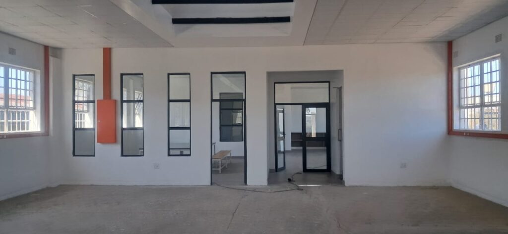 Interior view of newly completed building corridor and windows